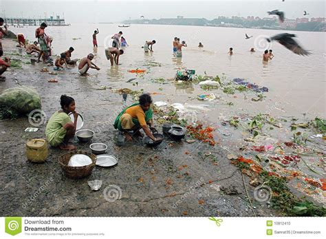 The main cause of river pollution is the dumping of waste. Ganga River Pollution In Kolkata. Editorial Image - Image ...