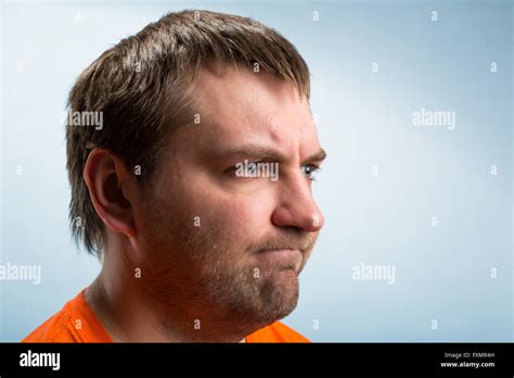 Profile Of A Gloomy Mans Face Stock Photo Alamy