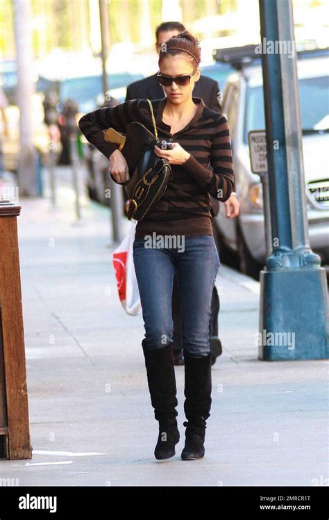 Actress Jessica Alba Checks Messages On Her Cellphone While Strolling In Beverly Hills Ca 10