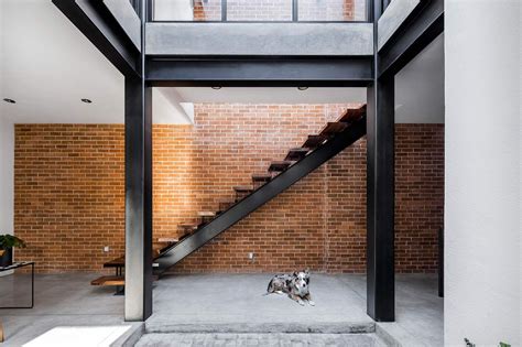 Exposed Brick Walls Steal The Show In This Modern Industrial Home