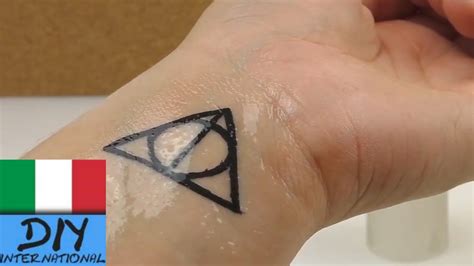 More images for i doni della morte tattoo » DIY Tattoo Harry Potter Simbolo "I doni della morte ...