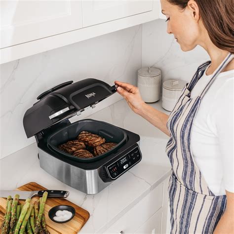 You'll want to pressure cook them first because short ribs are quite tough, so to just outright grill them, or oven roast them in a short amount. Ninja Foodi Grill - AG301 | BIG W