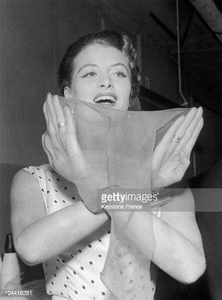 The French Model Capucine Presenting A Pair Of Nylon Stockings With