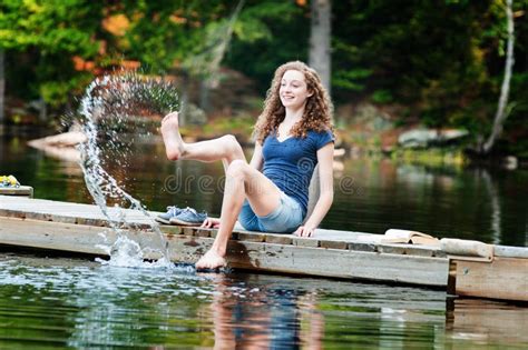 Splashing In A Lake Stock Photo Image Of Teenager Summer 56416868