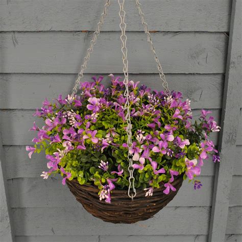 Even if you're tight on space or have a large outdoor area, we have a vast selection of all types of artificial trees. Lilac Lobelia Fake Hanging Basket - The Artificial Flowers ...