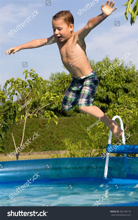 Little Boy Jumps Into The Pool Stock Photo 302199170 Shutterstock