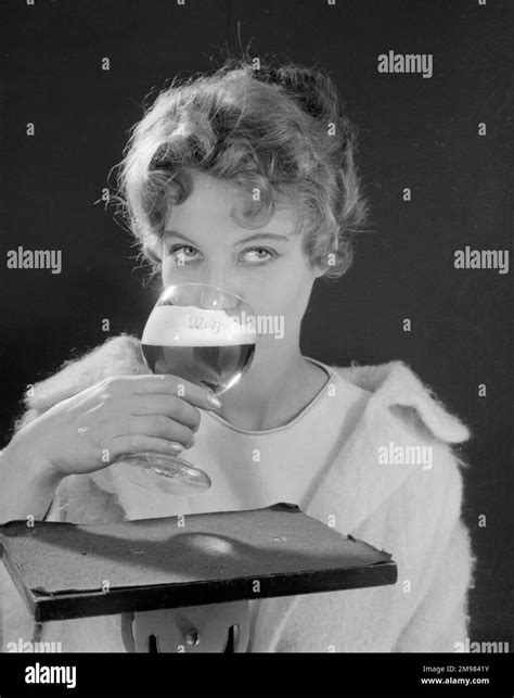 Advertisement For Mandb Amber Beer Female Model Gillian Watt Drinking From A Glass Stock