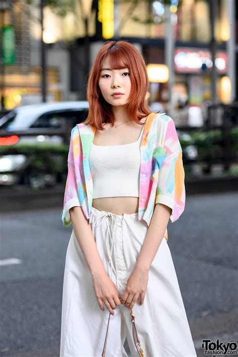 19 Year Old Japanese Model Uta On The Street In Harajuku With An Orange