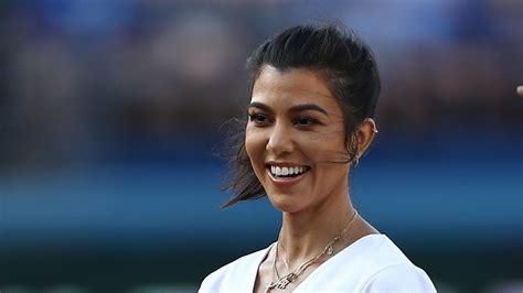 kourtney kardashian throws out the first pitch at l a dodgers game see the pics