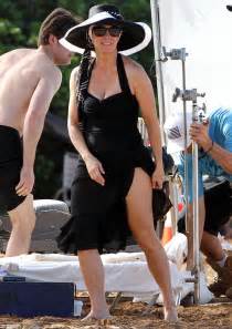 Monica Potter Strips Down To Cleavage Baring One Piece To Film
