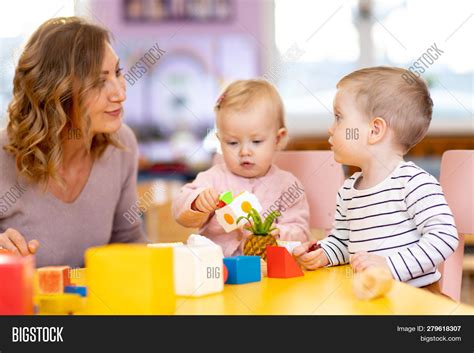 Nursery Babies Playing Image And Photo Free Trial Bigstock
