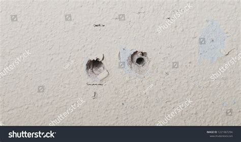 Bullet Shot Hole Wall Images Stock Photos And Vectors Shutterstock