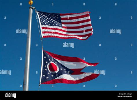 A United States Flag Flying Over An Ohio State Flag Stock Photo Alamy