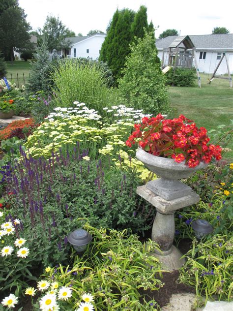 Come over to my neck of the woods and see an enchanting garden or two. The Home Garden Tour - Rotary Botanical Gardens