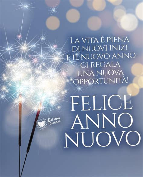 A Dandelion With The Words Felice Anno Nuovo Written In Italian