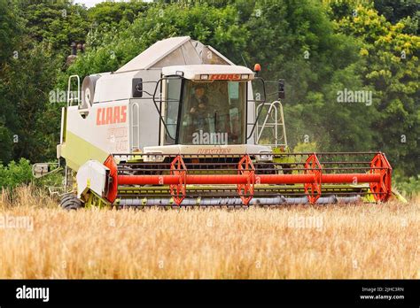 A Claas Lexion 440 Combine Harvester Harvesting Barley In Leedswest