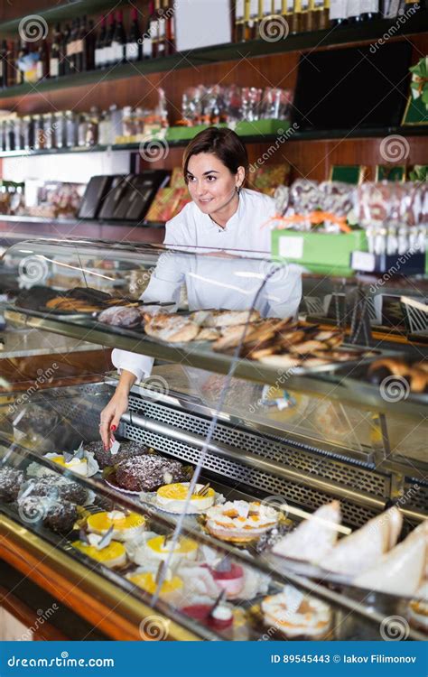 Female Seller Assisting In Choosing Dessert Stock Image Image Of Girl
