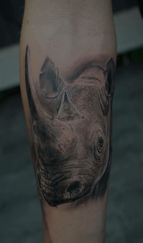 Rhinoceros Tattoo Rhino By Norbert Bogdan Jungle Tattoo Arm