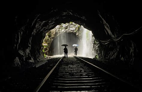 Safety Walking Through An Active Railway Tunnel During A Long
