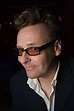 Greg Proops, a sharp-dressed comic, brings his act to Hilarities ...