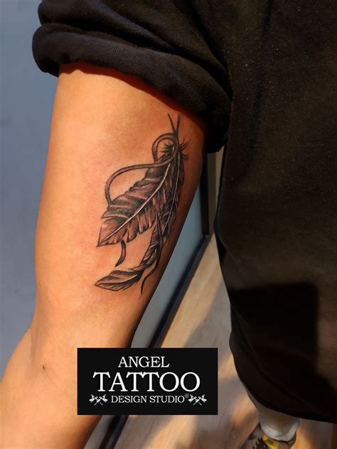 Feather Tattoo On Inner Bicep Feather Tattoo For Men Feather Tattoo