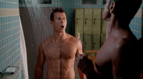 John Stamos And Glen Powell Strip Down And Hit The Showers On Scream Queens WATCH