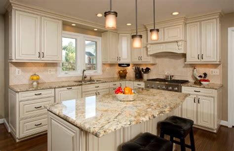 Moon white granite our finely grained, intricately patterned moon white granite features speckles and swirls of bright ivory threaded with silvery grey and jet black. Warm white kitchen take 2 | New kitchen cabinets, Kitchen ...