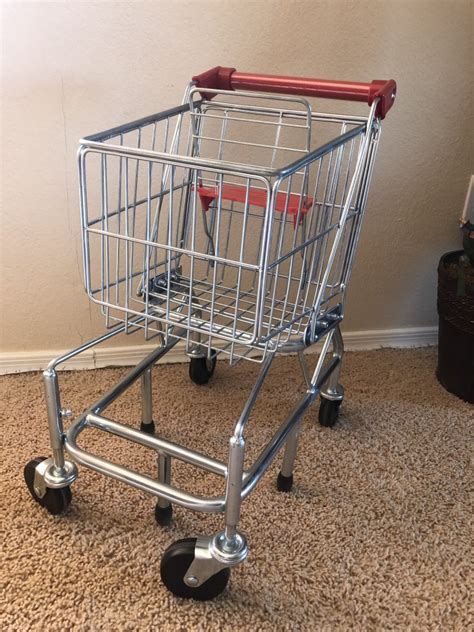 This Little Metal Grocery Cart Toy Is Just Like A Real Shopping Cart