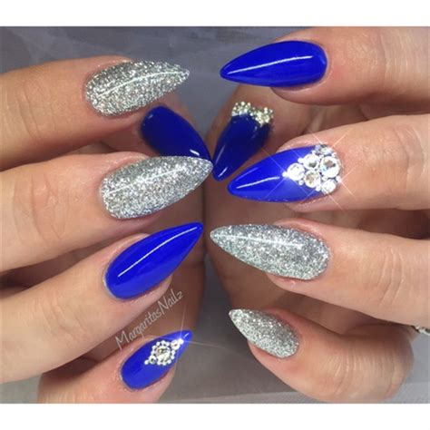 What's the best way to design blue nails? Stunning Blue And Silver Nails WIth Sharp Nail | Picsmine