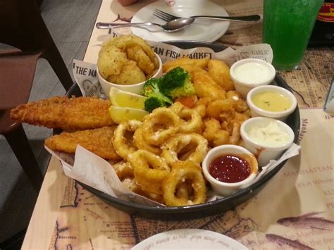 / it is an icon with title. Cat Eats in Singapore: Seafood Feast at Manhattan Fish Market
