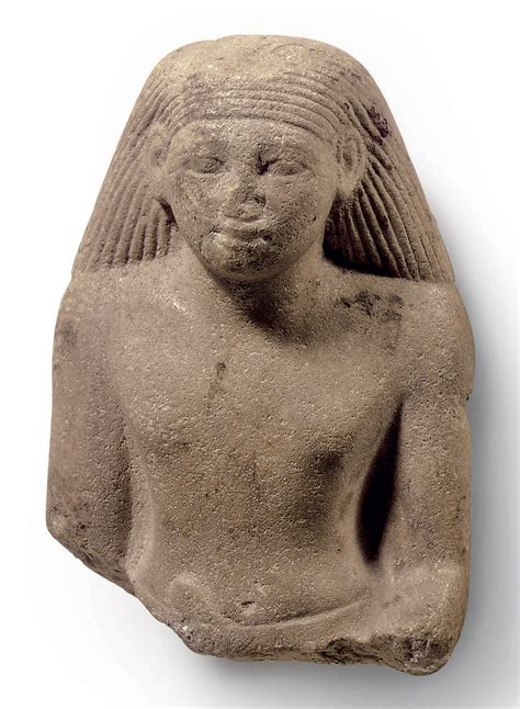 An Egyptian Crystalline Limestone Figure Of A Man