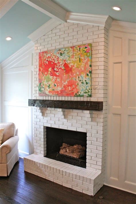 Cutting and placing the tile. Guehne-Made | House of turquoise, Painted brick fireplaces ...
