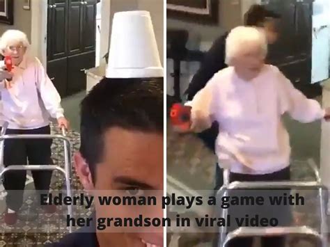 Grandma Plays A Game With Grandson Elderly Woman And Her Grandson Play