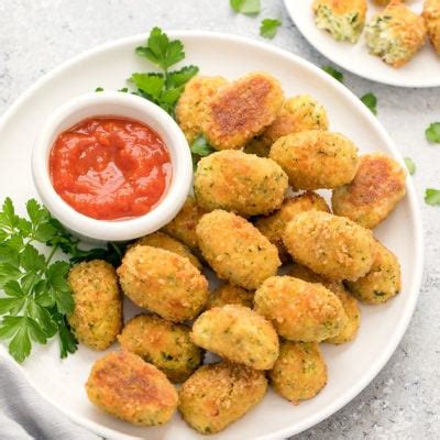 Our keto zucchini bites are the perfect mix of nutritious zucchini and yummy cheese for a delicious & healthy keto snack! Keto Zucchini Tots - Kirbie's Cravings