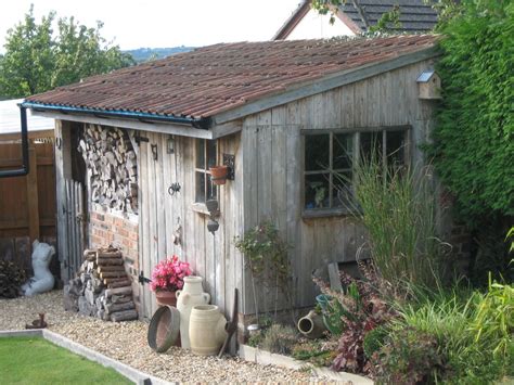This Is The Potting Shed Ade Made Mewith Attached Wood Store This