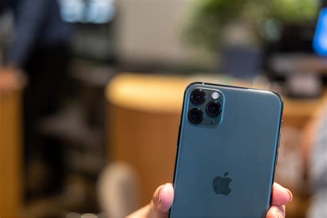 The camera app on iphone 11 pro shows you through the translucent ui what you could capture with the ultra wide lens. iPhone 11 Pro Max review: Hands on with Apple's best ...