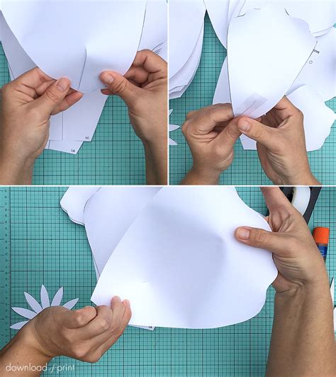 There are free rose paper flower templates you can download for the petals and the leaves. How to make giant paper roses plus a free petal template