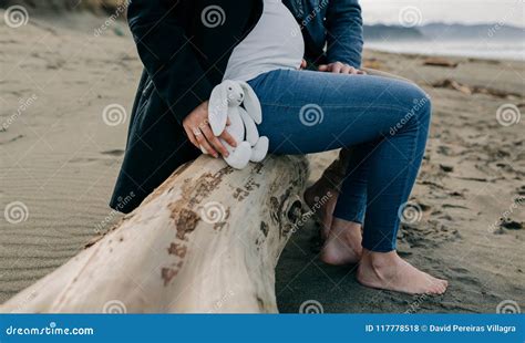Pregnant On The Beach With Her Partner Stock Photo Image Of Pregnancy