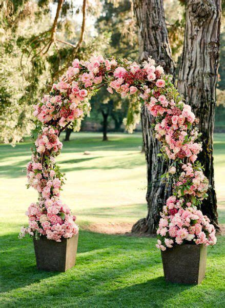 Pink Flora Wedding Arch Alter Climbing Roses Bugle Vine Or Clematis