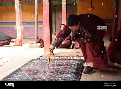 Buddhist Monk Practicing Drawing A Mandala Inside Sakya Monastery