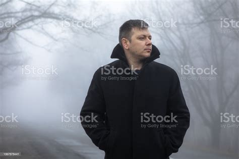 Portrain Man In Fog Landscape Man Walking Alone On Scary Foggy Misty
