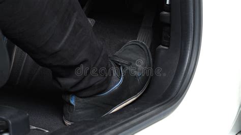 Man Foot And Accelerator And Brake Pedal Inside The Car Stock Photo
