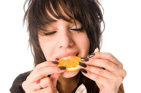 Free Photo Girl Eating Orange