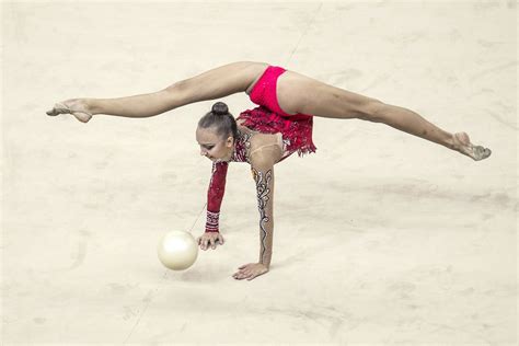Here Are 8 Bizarre Yet Beautiful Photos Of Womens Rhythmic Gymnastics Time