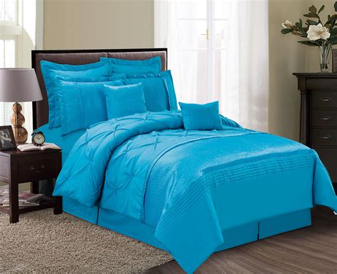 This queen comforter set by bedsure includes one comforter, one bed skirt, one fitted sheet, two pillowcases, and two pillow shams. 8-Piece Aubree Pinched Pleat Ocean Blue Comforter Set