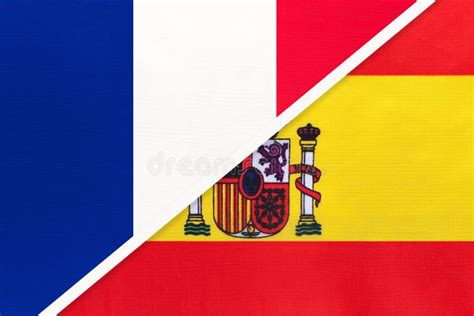 France And Spain Symbol Of Two National Flags From Textile