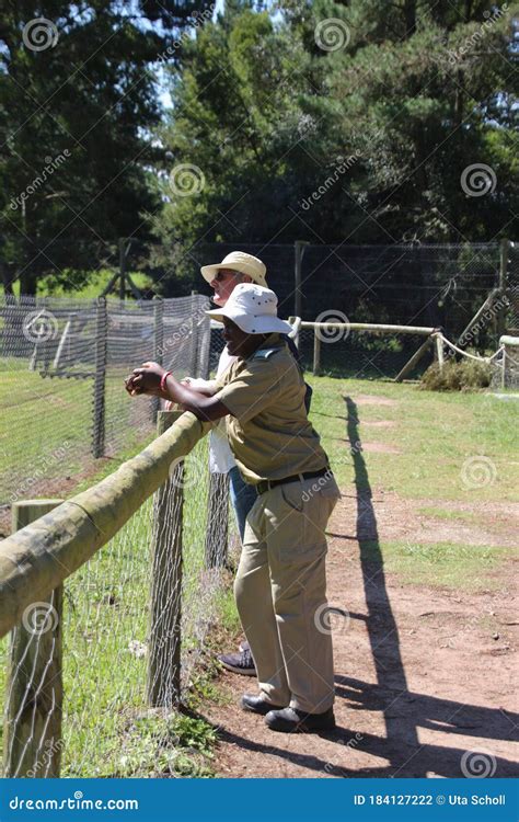 a guide and a visitor in the jukani wildlife sanctuary south africa editorial photography