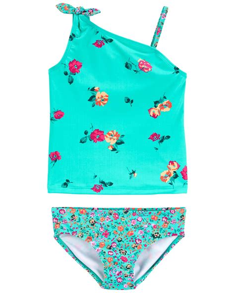 with colorful florals and fun shoulder details this two piece swimsuit is super sweet plus