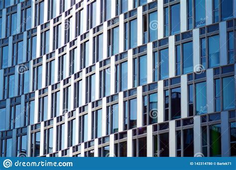 Modern Office Building Facade Abstract Fragment Shiny Windows In Steel