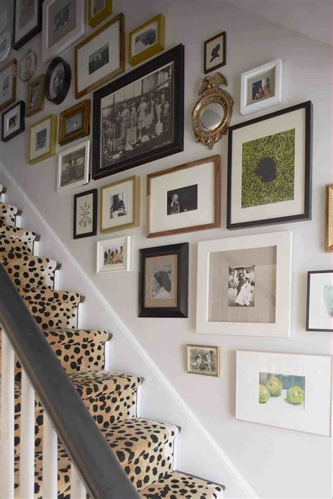 3 Stylish Ways to Display Family Photos | Eclectic gallery wall, Gallery wall stairs, Gallery ...